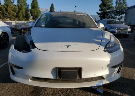 2020 Tesla Model 3 из США, поврежденный, VIN 5YJ3E1EA9LF633236